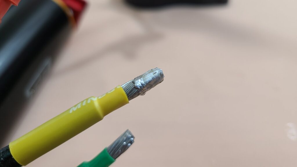 8 AWG Wire With Solder At The Tip