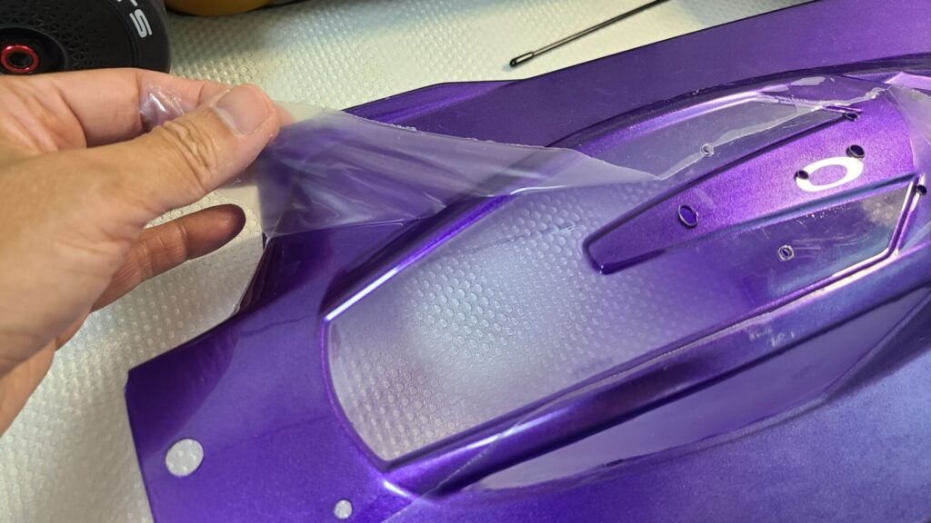 Removing thin plastic coating